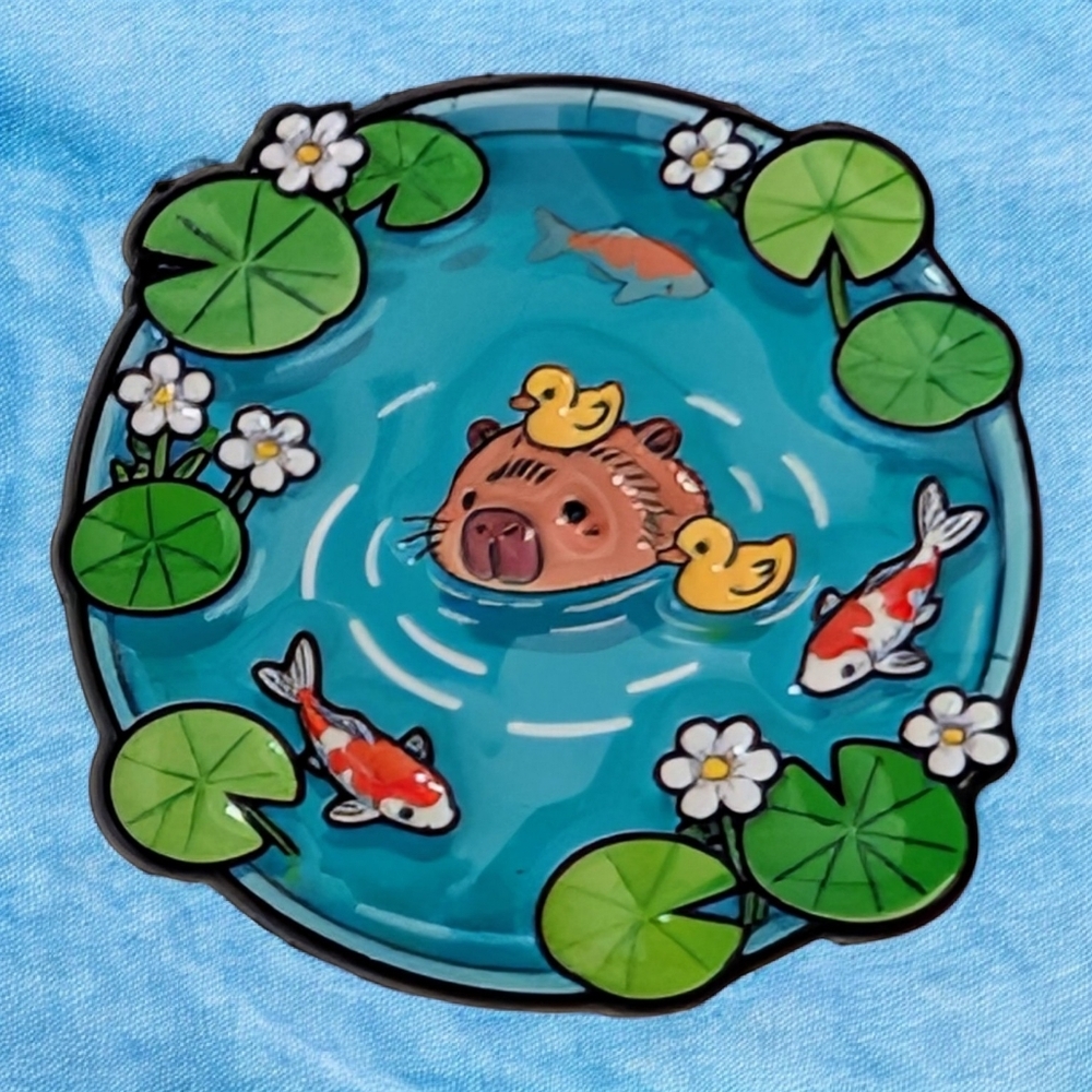 Capybara Hanging With Ducks And Koi Fish In A Pond Enamel Pin